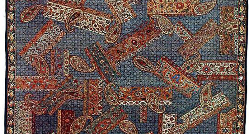 فرش گلچین حاشیه ها اثر استاد رسام عربزاده در موزه رسام