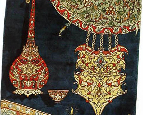 تابلو فرش شمع و قندیل اثر استاد رسام عربزاده در موزه فرش رسام