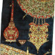 Candle and Lantern Carpet Panel Created by Rasam Arabzadeh in Rasam Carpet Museum
